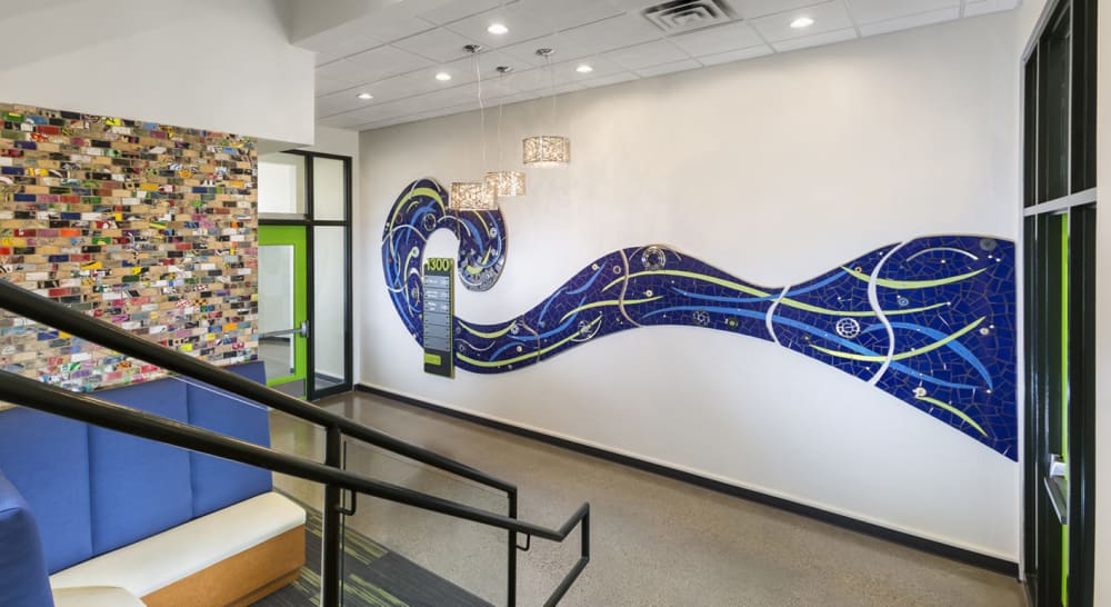Big Blue Wave | Mosaic in Art & Wall Decor by Stacia Goodman Mosaics | 1300 Lagoon Building in Minneapolis