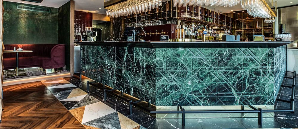 Tartan marble wall covering | Paneling in Wall Treatments by Lithos Design | Van der Valk Hotel Breda Princeville in Breda