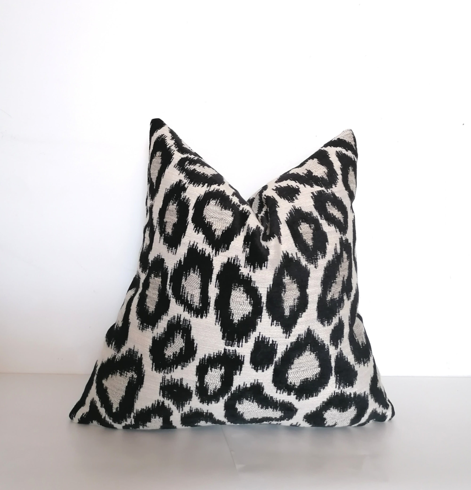 Black and on sale white leopard pillow