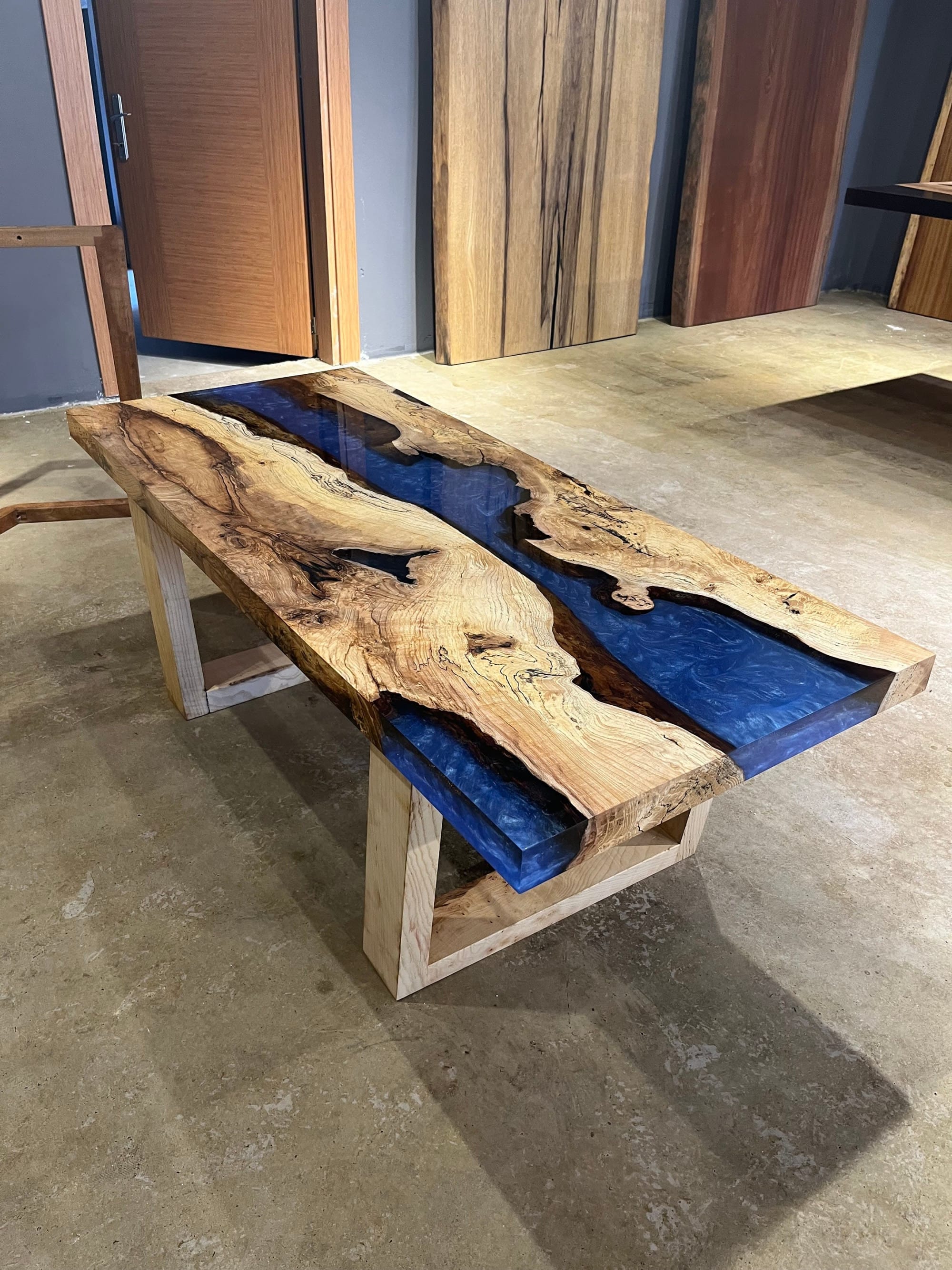 Olive Wood Coffee Table with Slate Blue Epoxy River Encasement – WoodLab