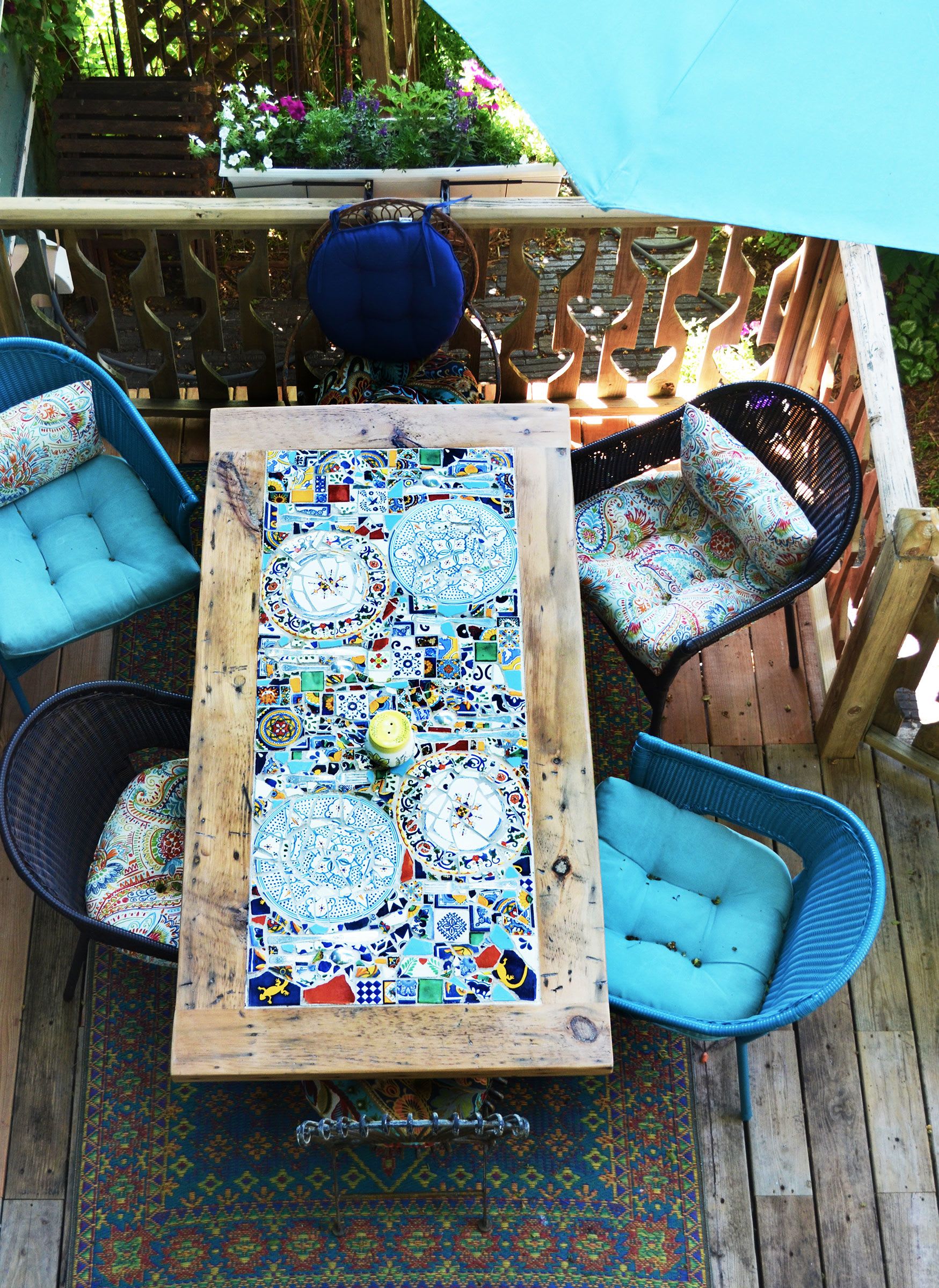 Rustic wood with mosaic tile inlay outdoor table by Abodeacious