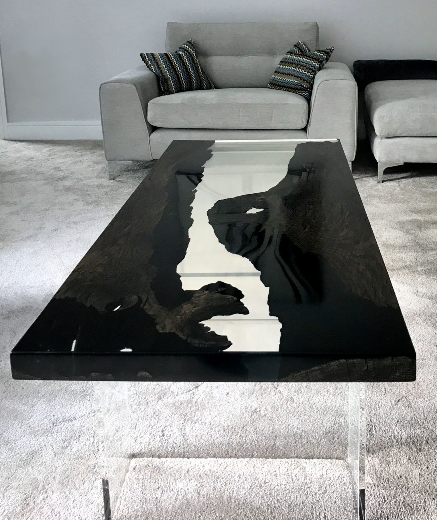 Modern black and clear glass table detail