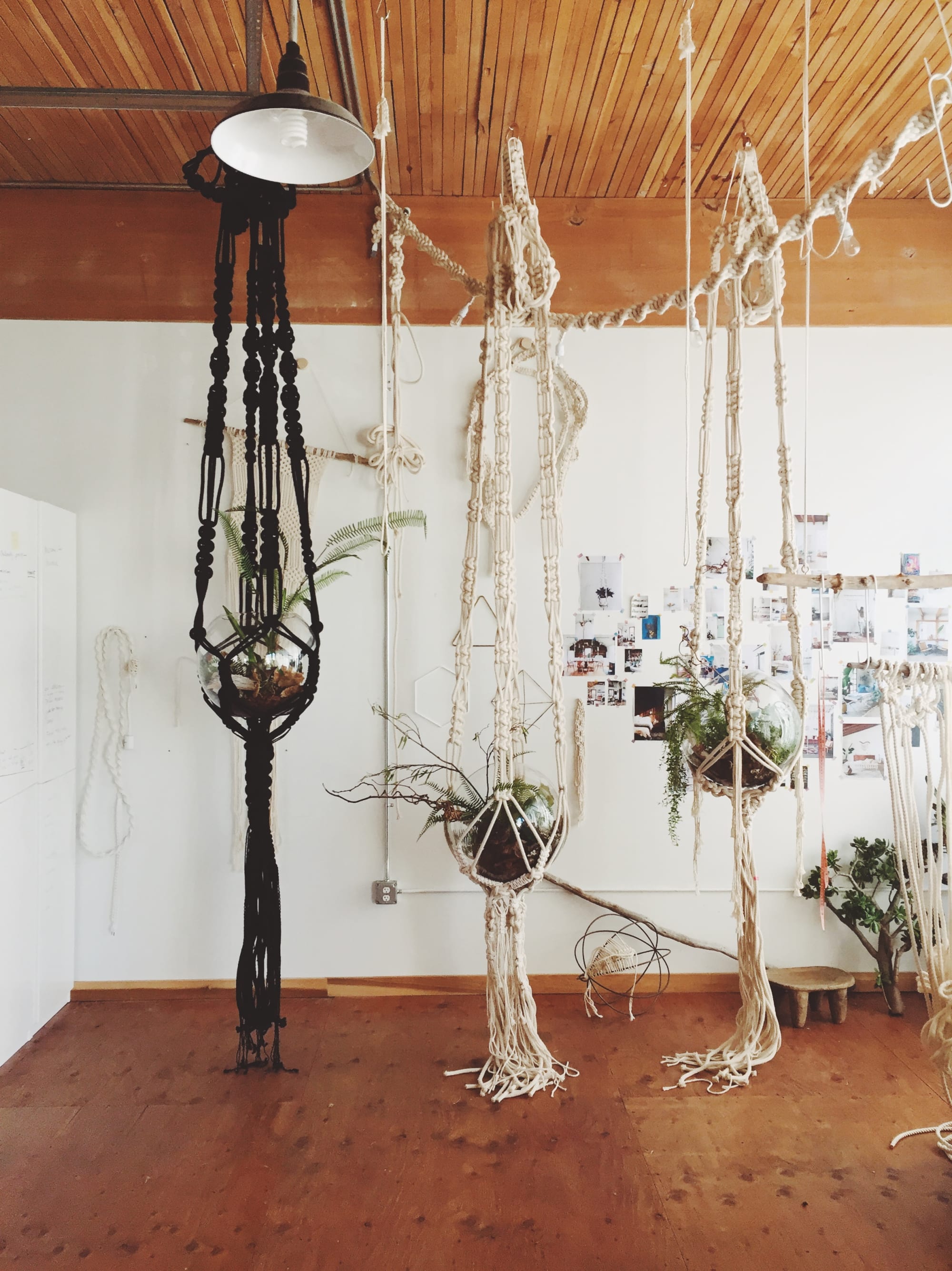 Macrame woven plant hanger with glass planter