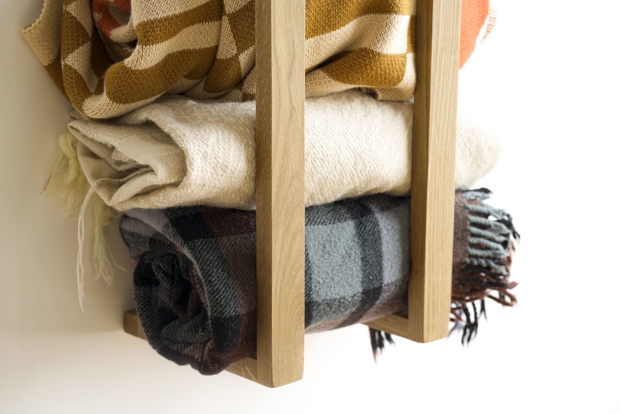 Wall mounted blanket online storage