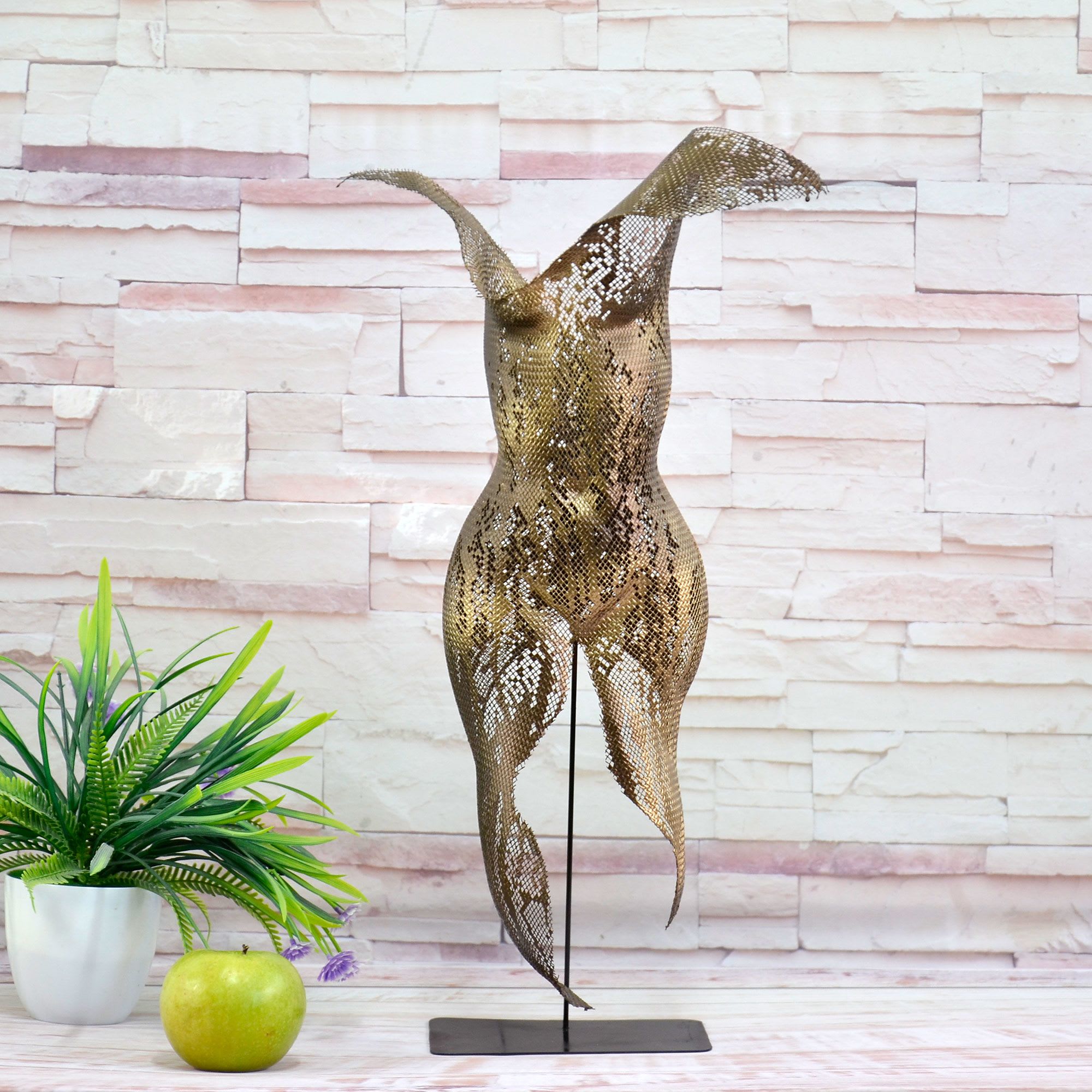 Metal torso female sculpture by NUNTCHI