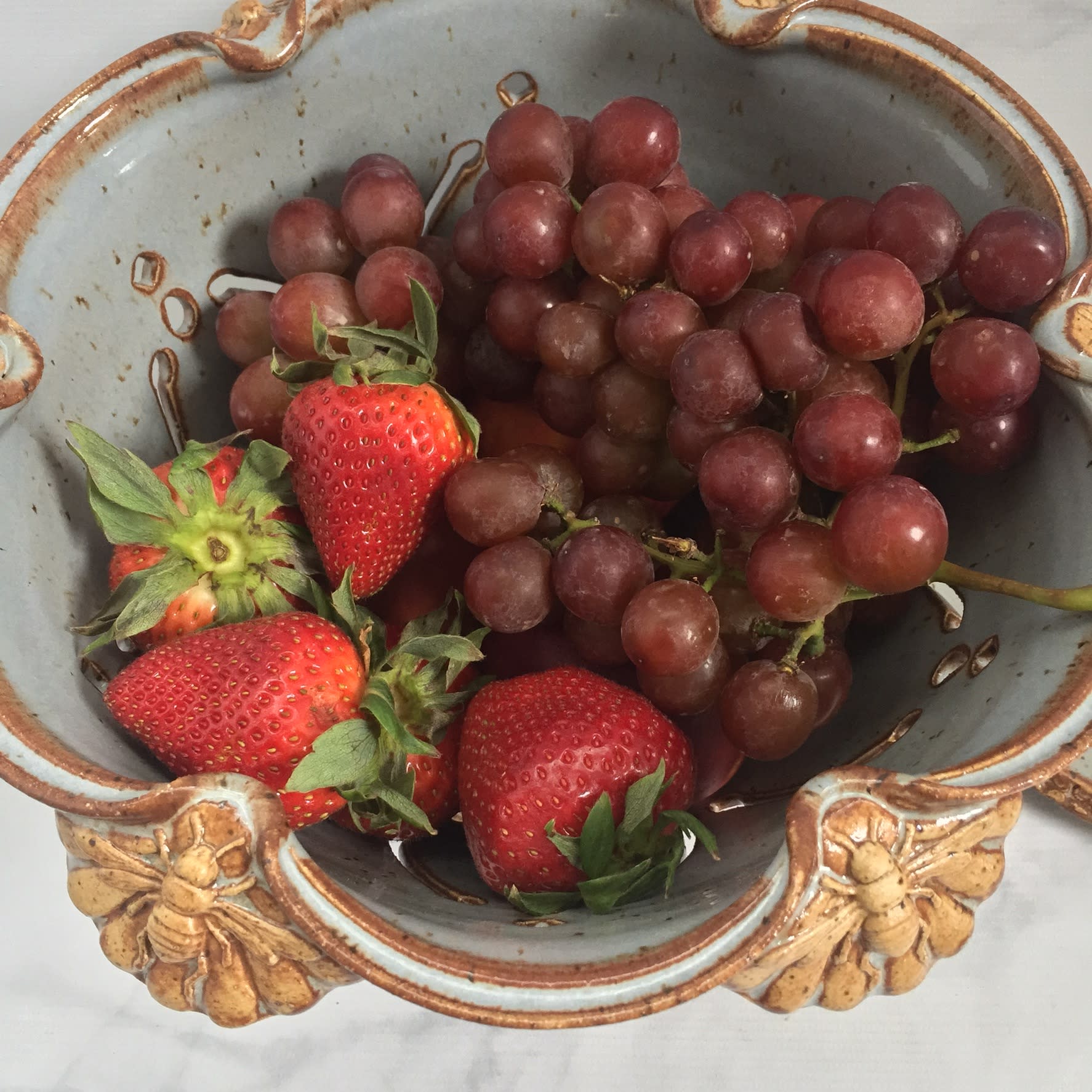 Handcrafted Curved Ceramic Tableware by Queen Bee Pottery seen at