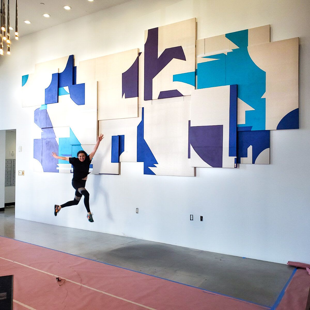 Layered Geometric Wall Sculpture with Blue Accents