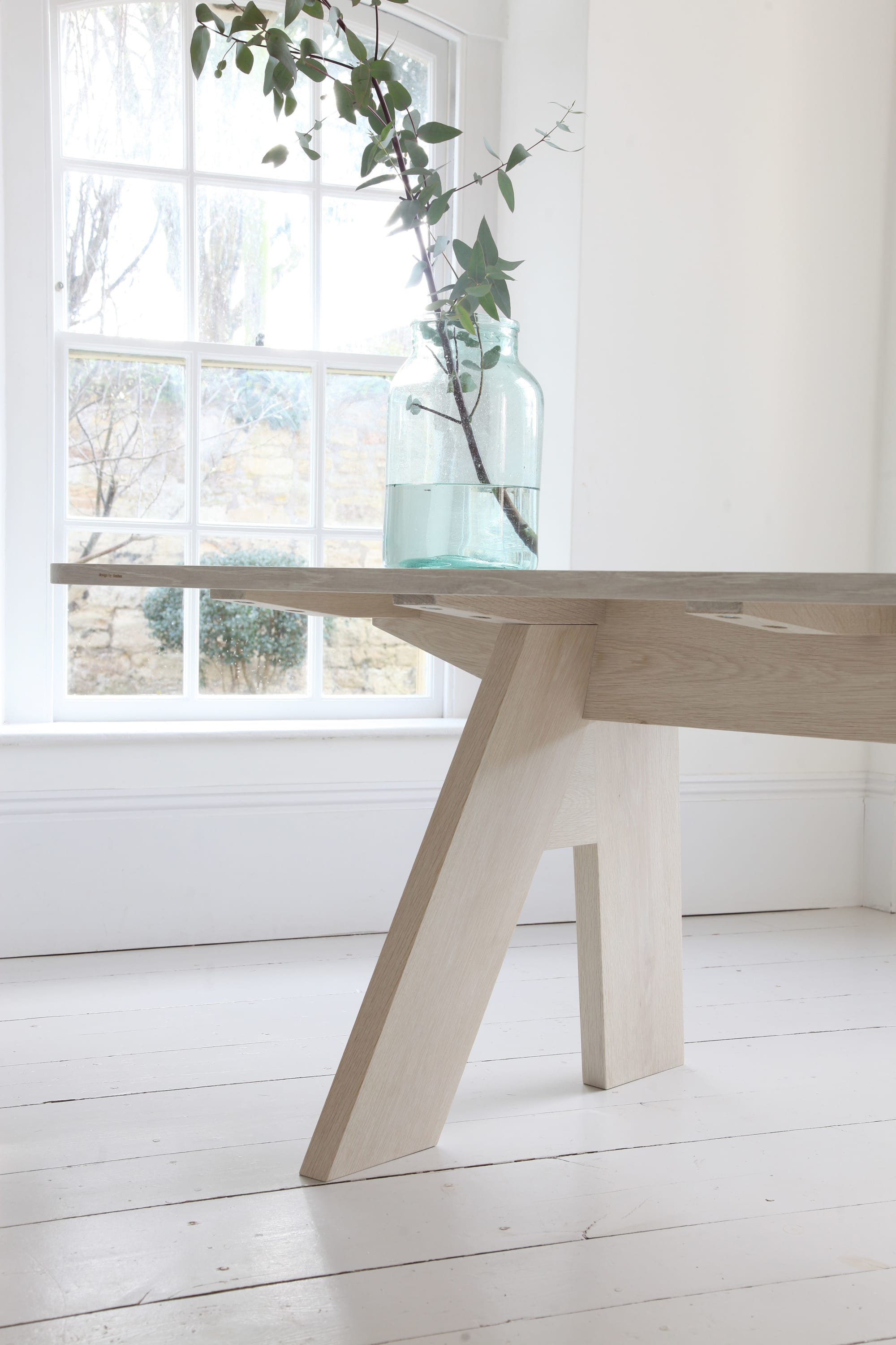 Bespoke bleached oak dining table by Design by Timber seen at Private