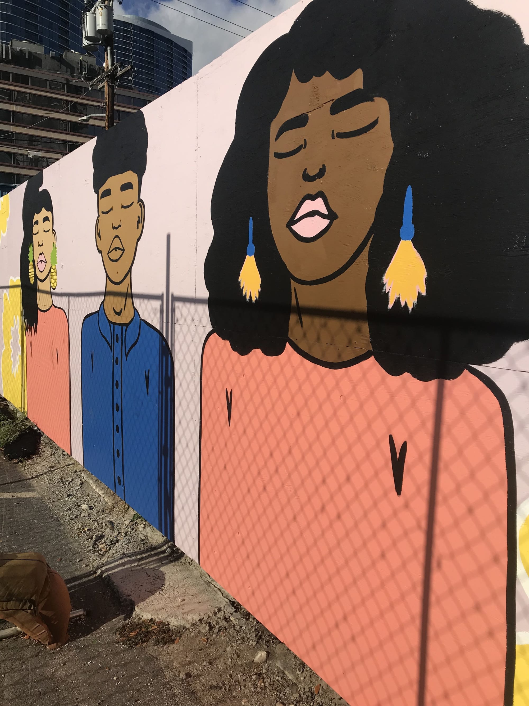 Girl with tassel earrings mural