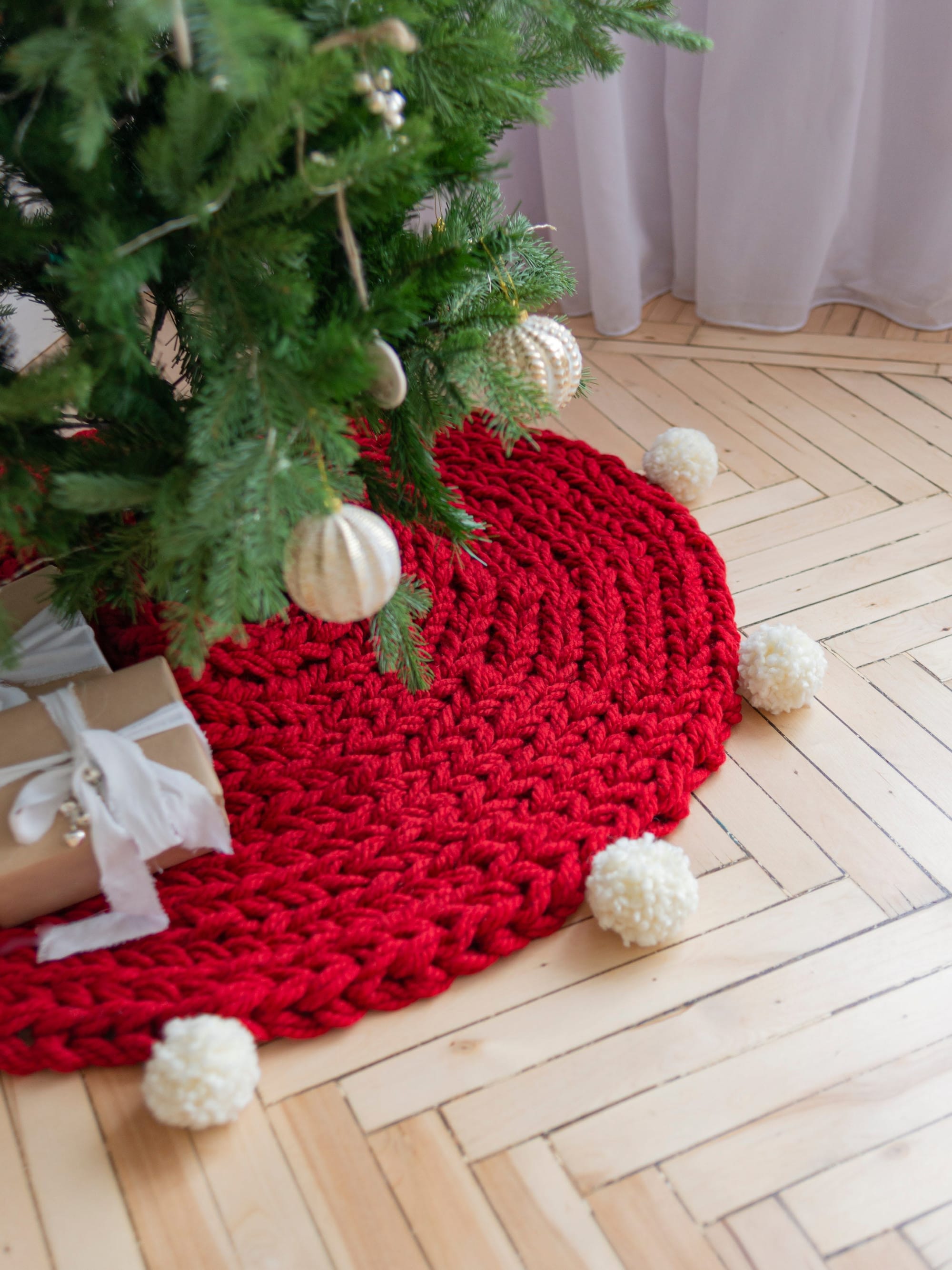 Red knitted Christmas tree skirt by Anzy Home