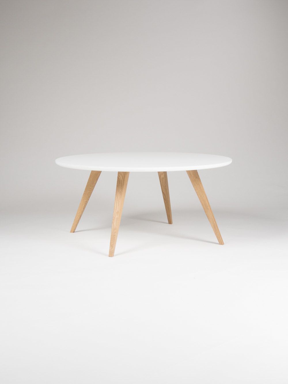 Round wood table with store white legs