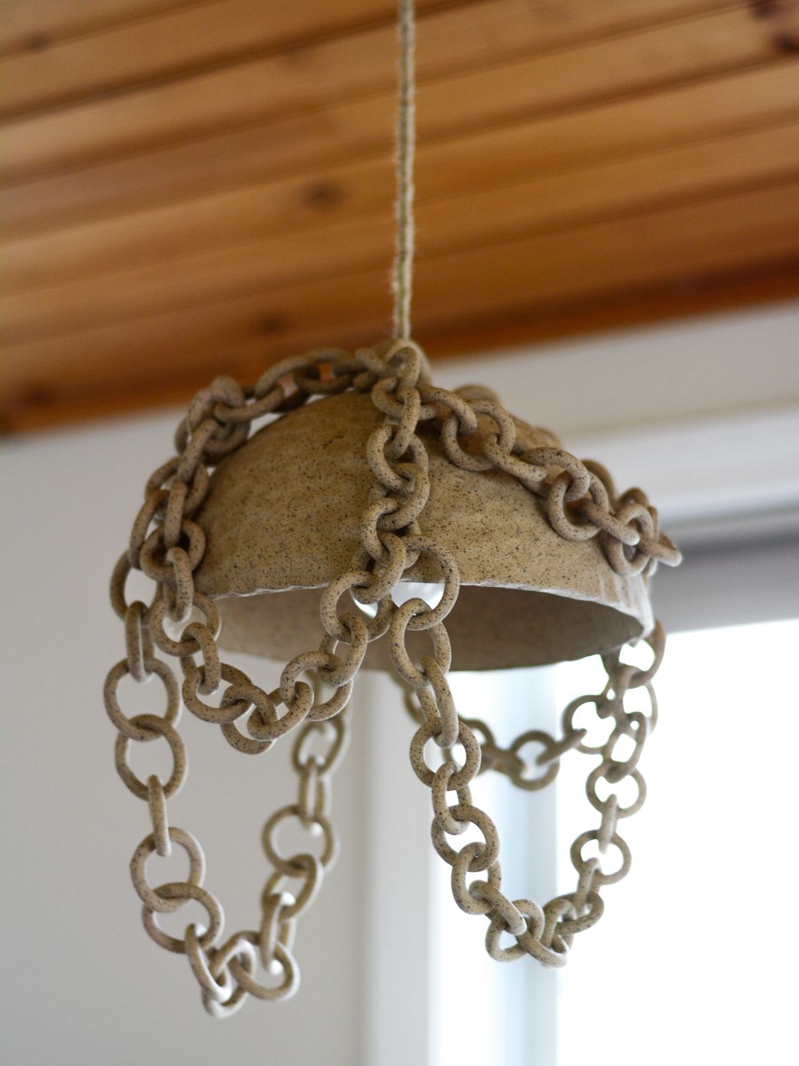 Stoneware chain pedant light by Asmaa Aman Tran