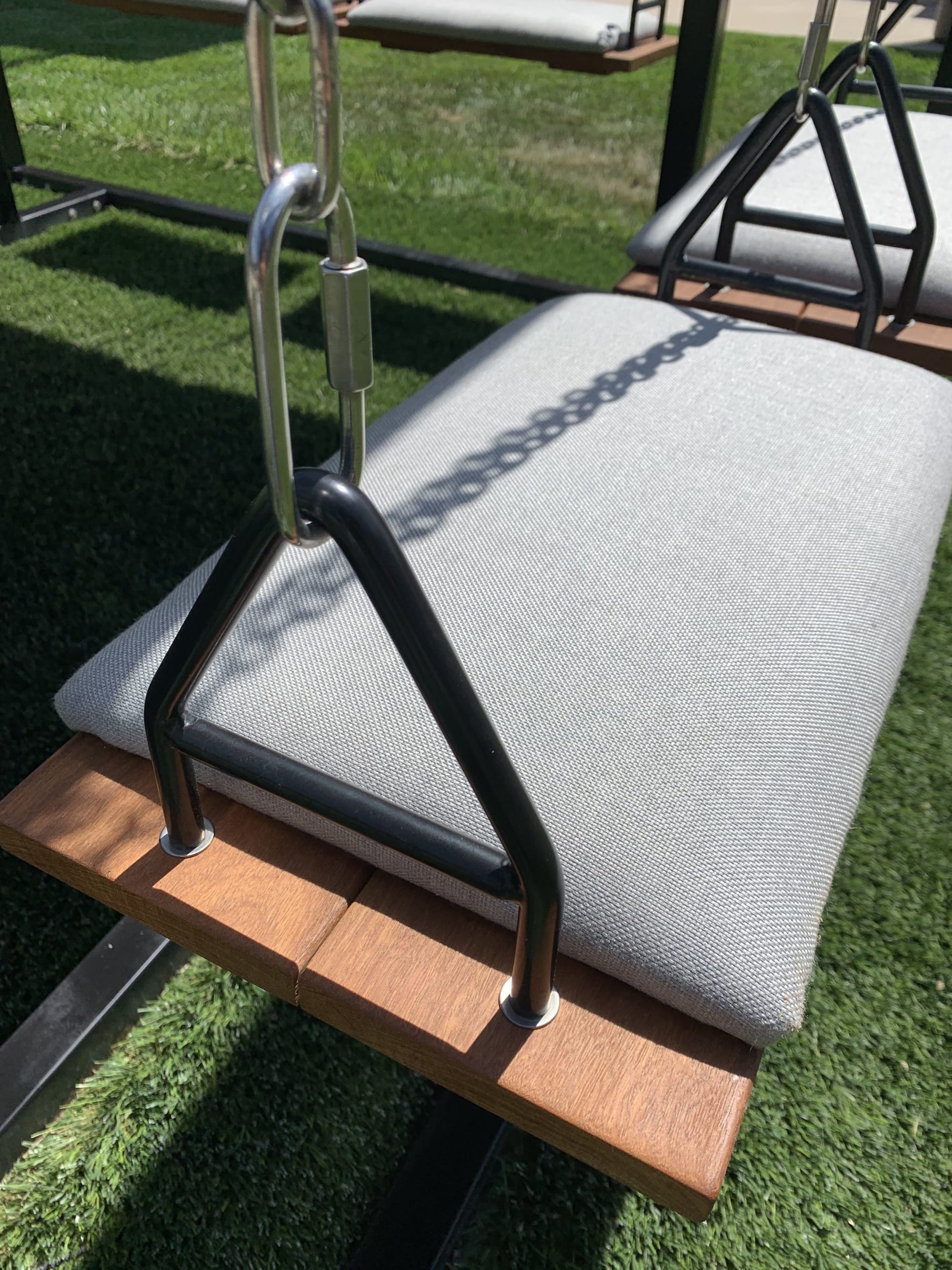 Kevin Hart's Black 8-Seater SwingTable Teak by SwingTables at