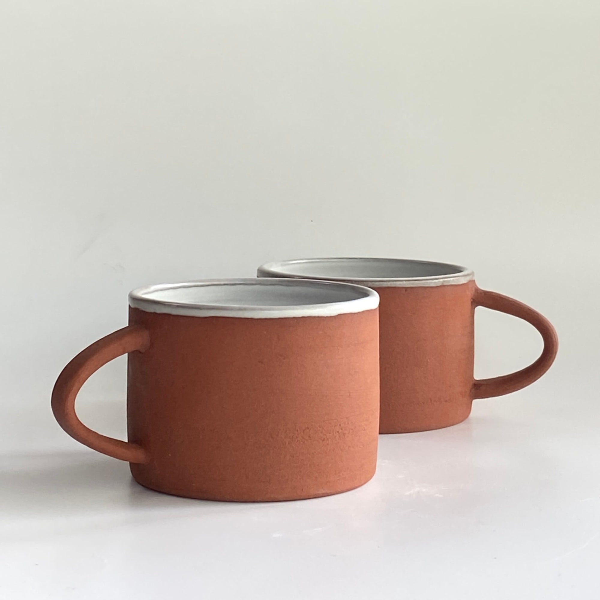 Handmade Modern Red Clay Coffee Mug, Short by cursive m ceramics