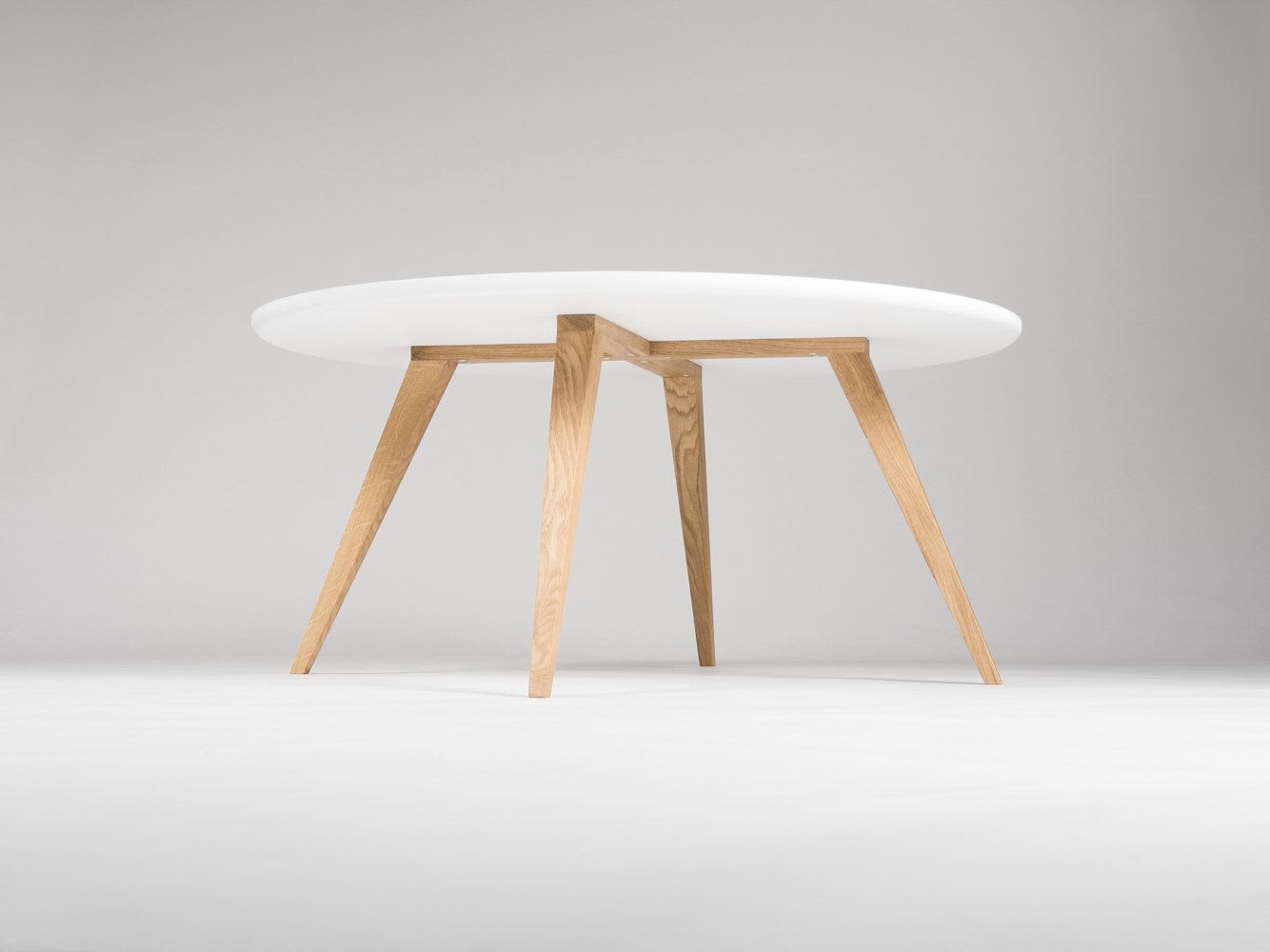 White coffee table with shop wooden legs