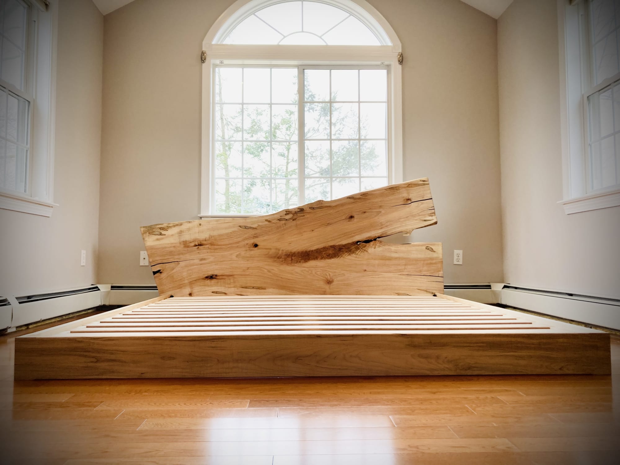 Queen size maple bed frame with live edge headboard by Rosehammer