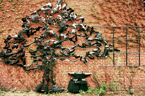 Longfellow Spreading Chestnut Tree Memorial Relief Sculpture | Public Sculptures by Dimitri Gerakaris | Cambridge Center for Adult Education in Cambridge