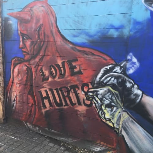 Love Hurts Mural | Street Murals by Dynamick | Nomadic Community Garden in London