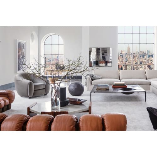 Banded Queen Leather Ball Ottoman | Benches & Ottomans by Moses Nadel | One Hundred Barclay Condominiums in New York