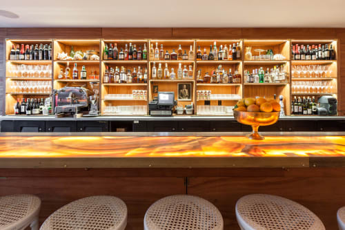 Glowing Onyx Bar Top | Tables by Ken Fulk | Leo's Oyster Bar in San Francisco