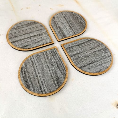Gray drop shape drink coasters of stone, wood. Set of 4 | Tableware by DecoMundo Home