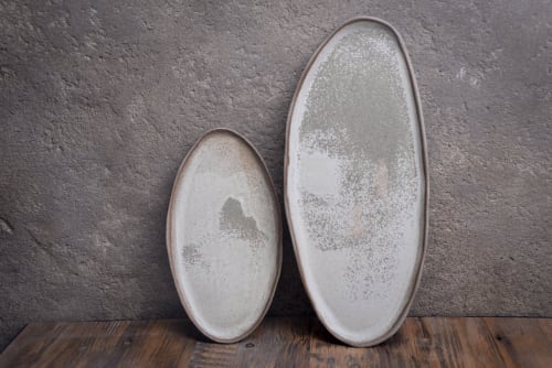 Organic natural shape elongated stoneware plates in grey | Dinnerware by Laima Ceramics