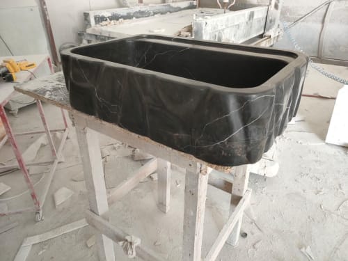 Hand-Carved Black Marble Bathroom Sink: Sculptured Toros Design | Water Fixtures by AYMARBLEDESIGN LLC