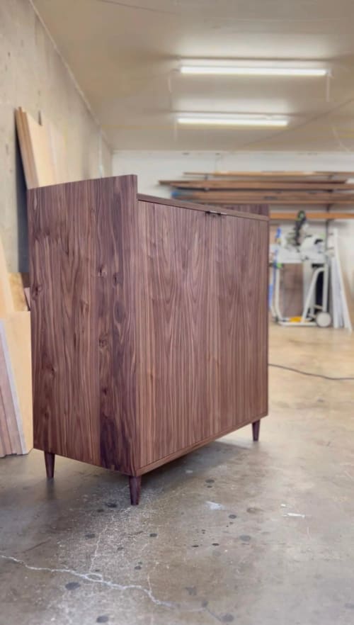 Liquor Cabinet with Glass Hangers, Bottle Storage, Drawers | Storage by Handhold Studio