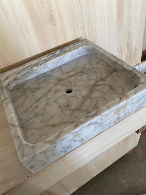 Hand Carved Calacatta Gold Marble Sink: Custom Vessel Basin | Water Fixtures by AEGEAN MARBLE ARTISAN ATELIER