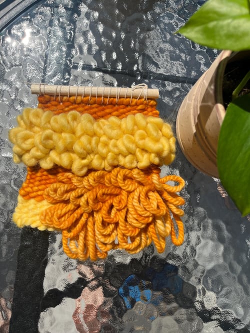Woven Tapestry: Burnt Orange, Amber, and Golden Yellow Hues | Embroidery in Wall Hangings by Satyam B