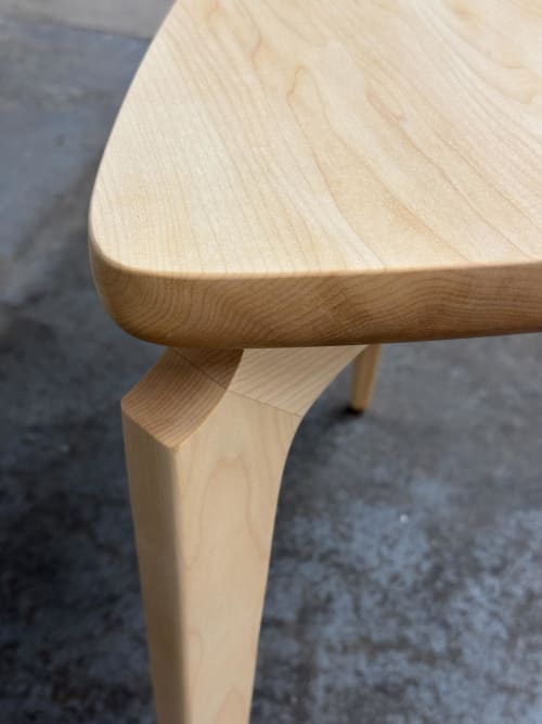 Modern Triangular Side Table: Hand-Sculpted Leg End Table, USA made | Tables by Marco Bogazzi