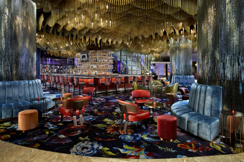 Custom Curved Collectors Back Bar Island with Mesh | Shelving in Storage by Amuneal | Vesper Bar in Las Vegas