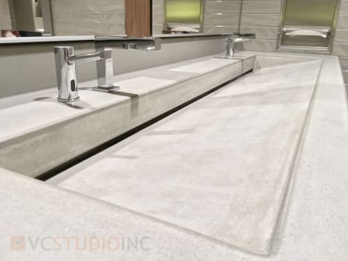 Custom Madison ramp style concrete sink. | Water Fixtures by VC Studio Inc. | Lincoln Square South (Lincoln Square Expansion) in Bellevue