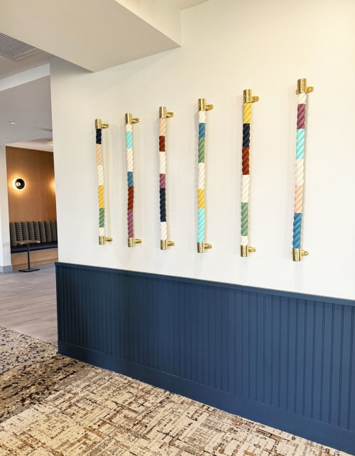 Vertical Painted Ropes | Wall Sculpture in Wall Hangings by Cassandra Smith | Triton Square Apartments in Groton