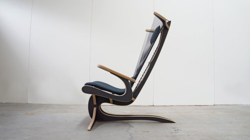 Hippokamp Lounge Chair & Footstool - Fabric | Chairs by Peter Qvist