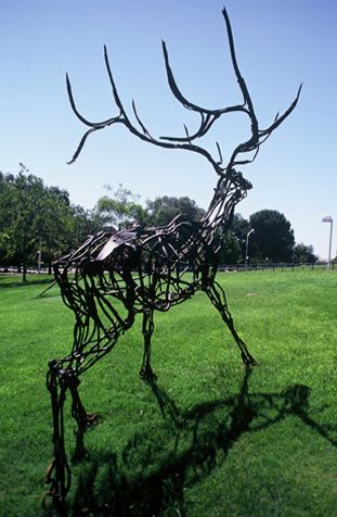 Large scale sculptures of elk and tiger | Public Sculptures by Wendy Klemperer Art Inc | California State University, Bakersfield in Bakersfield