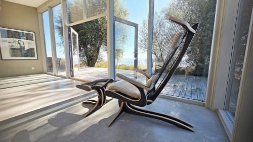 Hippokamp Lounge Chair & Footstool - Sheepskin | Chairs by Peter Qvist