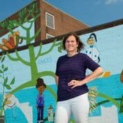 Uprooted/re/Rooted building sized mural | Street Murals by Marion Wilson | Philadelphia in Philadelphia