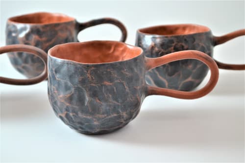 Pinched black cup | Cups by Homatino ceramics | Speira in Oia