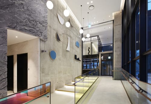 RYSE Hotel lobby wall installation by Cody Hudson seen at Ryse Hotel