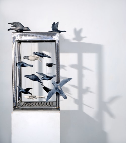 Caged Birds, steel structure with clay bird scuptures | Sculptures by Susan Hostetler Studio