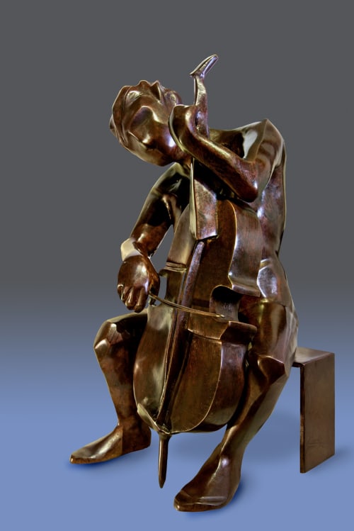 Woman musician playing the cello while seated. | Sculptures by Dina Angel-Wing | Berkeley, CA in Berkeley