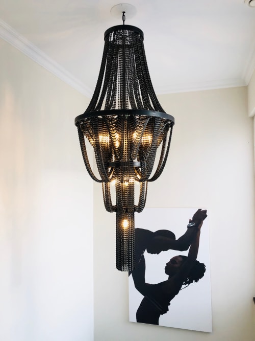 Chandelier in a private home staircase | Chandeliers by Pleiades lighting