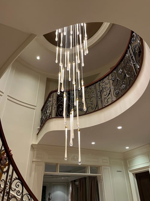 Ferraro Long Staircase Chandelier in hand-blown glass | Chandeliers by Galilee Lighting