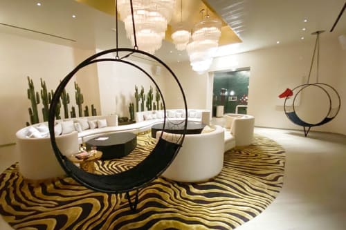 Wheel Swing Chair in the Virgin Hotel, Las Vegas | Chairs by Studio Stirling