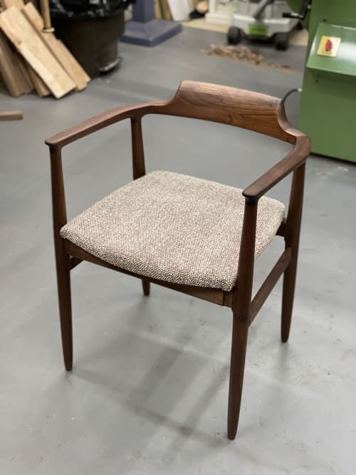 Henry the Armchair in Walnut with Upholstered Seat | Chairs by Brian Holcombe Woodworker | Independent Lodging Congress, in the William Vale NYC in Brooklyn