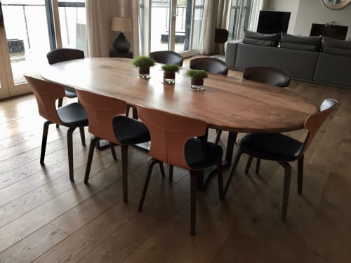 Oval 'Pebble Edged' Walnut Table on Black Waxed Steel Legs | Dining Table in Tables by Jonathan Field