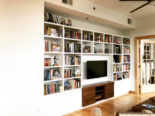 Book display / Media cabinetry | Furniture by Heirloom Custom Woodworks LLC | The Legacy Condominiums in Minneapolis