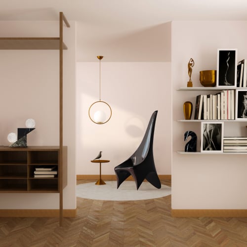 "Nyx" lounge chair in deep burgundy lacquered fiberglass | Chairs by Carcino Design