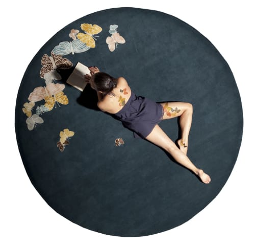 Spirit in the night sky. Round rug with butterflies. | Rugs by Sergio Mannino Studio